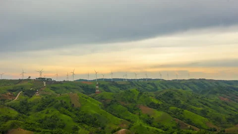Time lapse of wind turbines in beautiful sunset Stock Footage 148154698