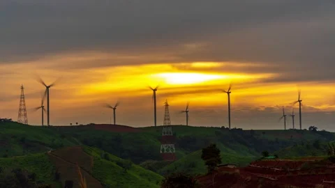 Time lapse of wind turbines in beautiful sunset Video stock 149496567