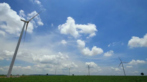 Time lapse wind turbines,blue sky and clouds running background. Stock Footage 45459785