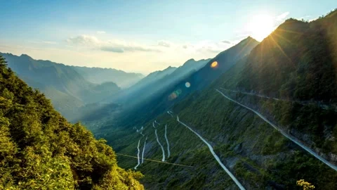 Time lapse of winding mountain road in deep valley Stock-Footage 332278194