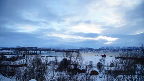 Time-lapse of winter clouds with Tromso bridge perspective. Stock Footage 275641640