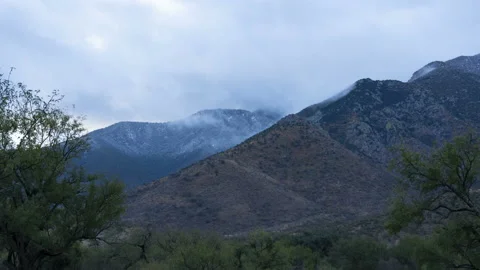 Time lapse of winter fog on high desert mountains Stock Footage 145809153