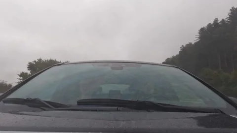 Time lapse: Wipers cleaning the windshield of a driving car  Stock Footage 214034005