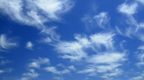Time lapse of wispy clouds moving across the sky. Stock Footage 557878
