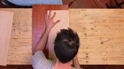 Time lapse of Wooden board sanding Stockbeeldmateriaal 111997553