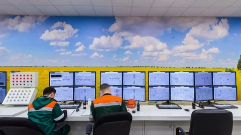 Time Lapse Workers at Computers Control Manufacturing Process Stock-Footage 81082903