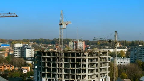 Time lapse of workers at large construction site pour and level concrete, Stock Footage 143389529