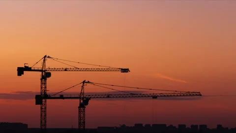 Time lapse of working cranes on the beautiful sunset sky background 스톡 동영상 275292925