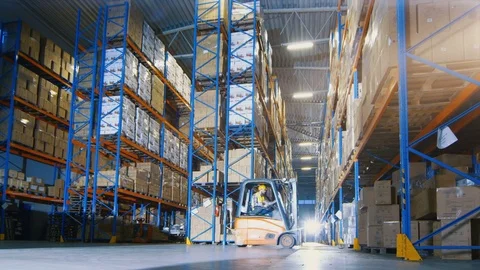 Time-Lapse of a Working Day in Big Modern Warehouse. Stock Footage