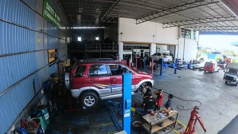 Time Lapse Of  Workshop While Repair A Car. Stock Footage 114428385