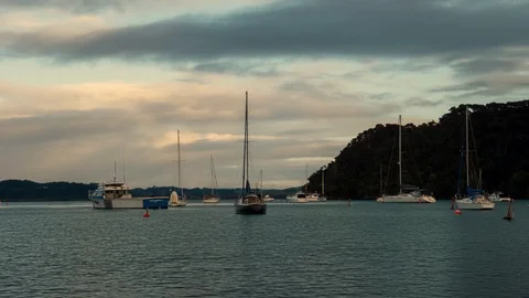 Time lapse of yachts moored in sheltered bay in New Zealand Stock Footage 114712910