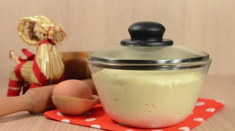 Time-lapse yeast dough escapes from a bowl Stock Footage 45295476