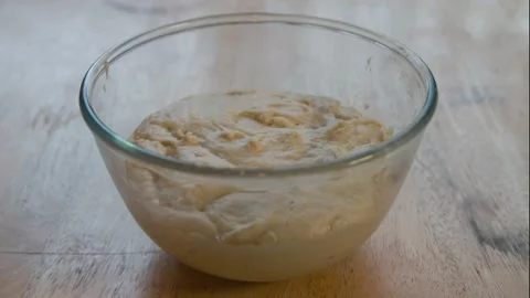 Time-lapse of yeast dough rising Stock Footage 234751757