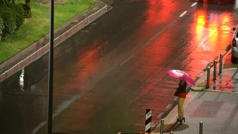Time lapse of young blonde hooker prostitute on sidewalk of an urban street Stock Footage 90312451