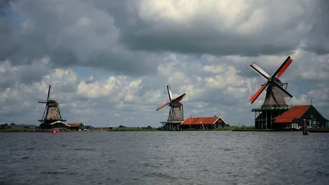Time Lapse of Zaan River and Historical Windmills At Zaanse Schans in Zaandam Stock Footage 99390846