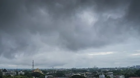 Time-lapse zoom out, Dramatic dark clouds over cities View of black sky Stock Footage 203679404