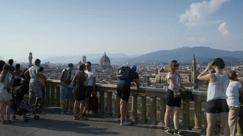 Time lapse. Zoom out. Panoramic view of Florence with crowd of tourists . Italy. Stock Footage 98901087