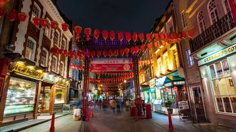 Time lapse zoom in view of Chinatown in London with street decorations at night Stock Footage 97396334