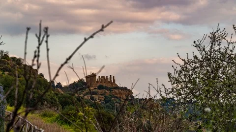 Time lapse zoom in view of Greek temple of Juno in Sicily at sunset Stock Footage 104599216