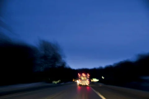 Time-lapsed drive behind an ambulance on a rural road. dv Stock Footage 324402