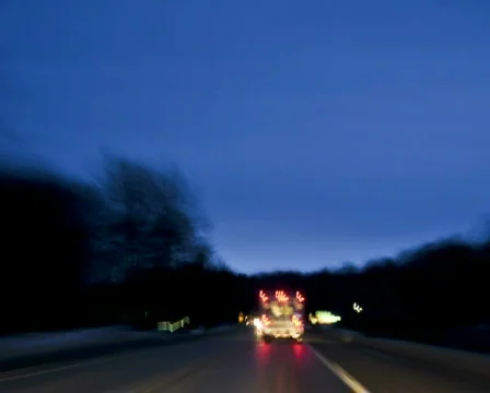 Time-lapsed drive behind an ambulance on a rural road. pal Stock Footage 324417