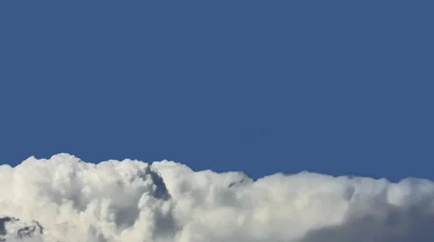 Time lapsed fluffy cumulus clouds pre keyed alpha channel Stock Footage 28924496