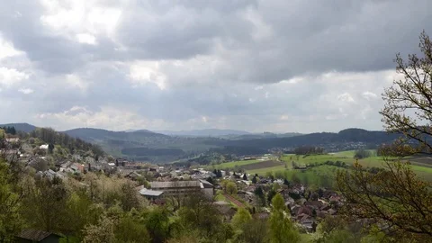 Time lapsed footage from moving clouds at Schoenberg in the bavarian forest Stock Footage 74831933