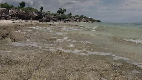 Time lapsed, man walking in the beach Stock Footage 257685037