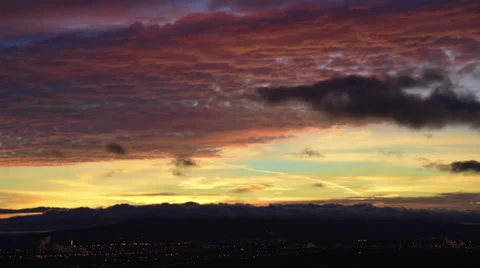 Time lapsed sunset with beautiful pink and orange cloudss Stock Footage 36100108