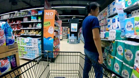 Time lapse,Shopping cart moving through supermarket aisles. Stock Footage 98923726