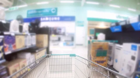 Time lapse,Shopping cart moving through supermarket aisles. Stock Footage 117428623