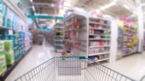 Time lapse,Shopping cart moving through supermarket aisles. Stock Footage 117428624