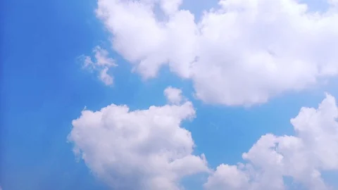 Time lapse,sky beautiful cloud scape white fluffy clouds over blue sky. Stock Footage 96073554