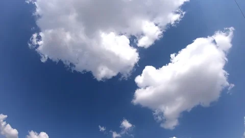 Time lapse,sky beautiful cloud scape white fluffy clouds over blue sky. Stock Footage 96486995