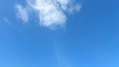 Time lapse,sky beautiful cloud scape white fluffy clouds over blue sky. Stock Footage 98916501
