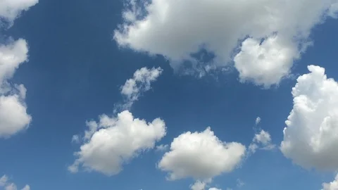 Time lapse,sky beautiful cloud scape white fluffy clouds over blue sky. Stock Footage 107666535