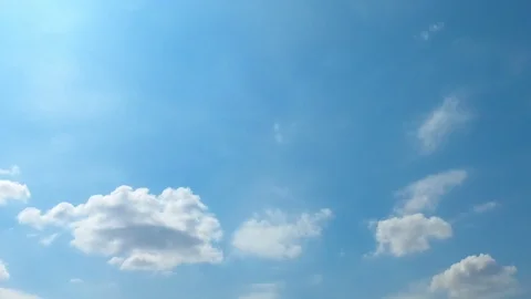 Time lapse,sky beautiful cloud scape white fluffy clouds over blue sky. Stock Footage 117592113