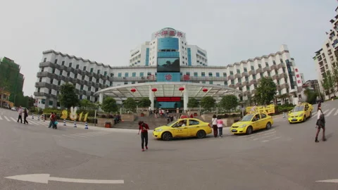 Time Lapse,Traffic flow in front of a large hospital in Chongqing,china Stock Footage 141646109
