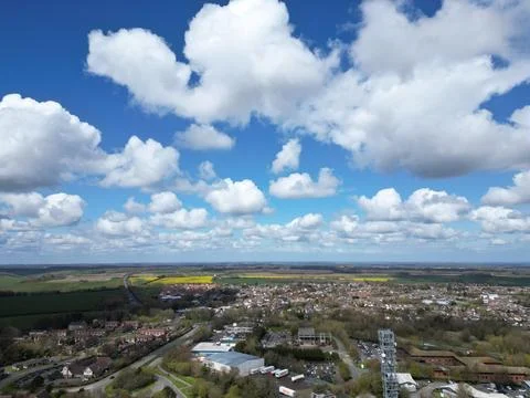 Time lapsuu of clouds over the countryside, aerial view of an urban area Stock Photos