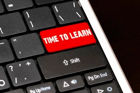 Time to learn on Red Enter Button on black keyboard Illustrazione stock