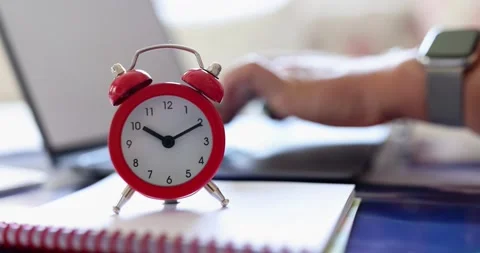 Time management and freelancer hands on computer keyboard and alarm clock Stock Footage 219930006