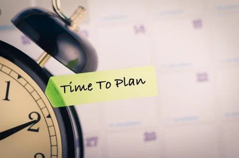 Time management concept, close-up image of word TIME TO PLAN on yellow sticky Foto stock