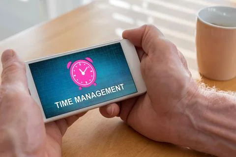 Time management concept on a smartphone Stock Photos