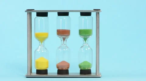 Time measurement with sand flowing through sandglasses Stock Footage 58658727