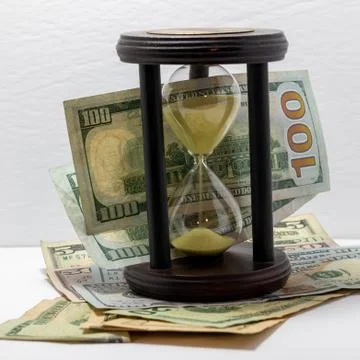 Time is money concept. Philosophy of business concept. Time running. Hourgla Stock Photos