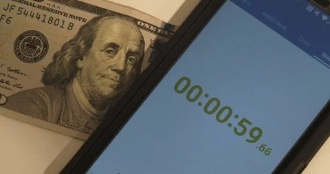 Time is Money - Digital Stop Watch and Money Stock Footage 89110677