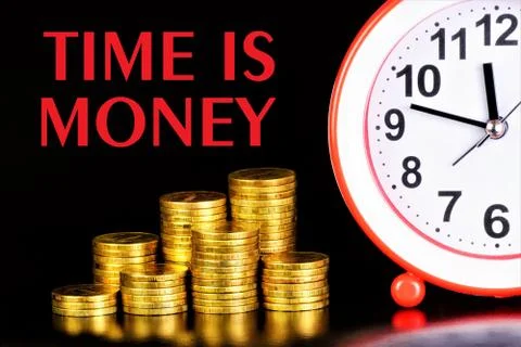 Time money-text message on the background of coins. Stock Photos