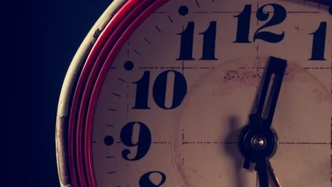 Time moves as the clock hands tick steadily towards ten and ten minutes Video stock 297598433