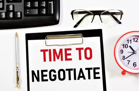 Time to negotiate. A text label in the planning notebook. Stock Photos