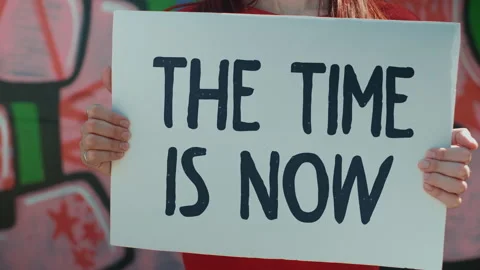 THE TIME IS NOW slogan close up on poster, female activist, picket Stock Footage 133755547